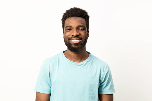 istock Cheerful Young Man Smiling on Plain Background Studio Portrait 2150299810
