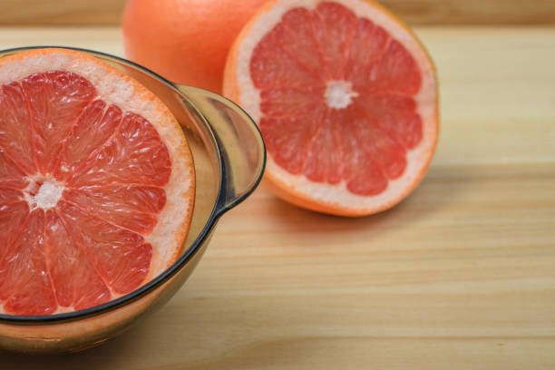sliced ​​grapefruit photo on white background