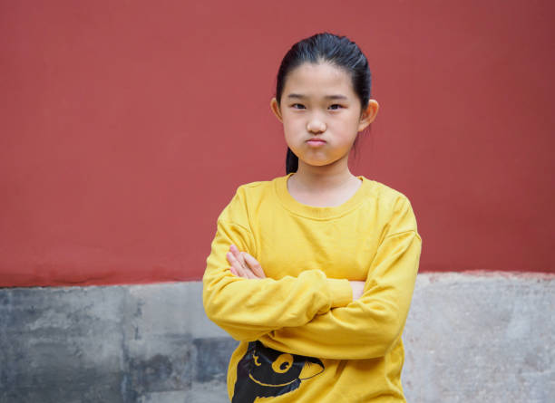 Little girl arms crossed