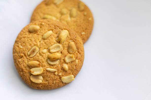 istock two cookies with nuts, sweet 2150301561