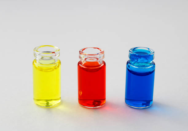 istock Bottles with yellow, red and blue ink 2150303105