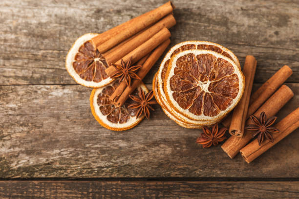 istock Cinnamon sticks and anise on a textured background. Cinnamon roll and star anise. Spicy spice for baking, desserts and drinks. Fragrant ground cinnamon.Place for text. copy space. 2150305172