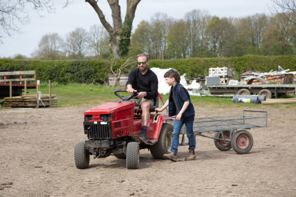 Selective focus on a pedal tractor pull and sled at a county fair. High quality photo