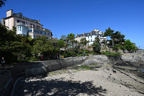 Dinard, France, april 18, 2024 : Houses lining the Au Clair de Lune promenade in Dinard