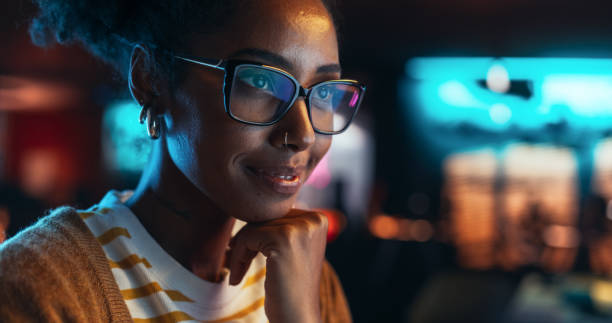 istock Portrait of a Beautiful Happy Female Using Desktop Computer, Analysing Data, Thinking and Solving Problems. Black Project Manager Working in Creative Agency, Reviewing Marketing Strategy 2150306880