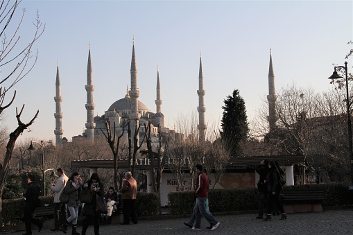 Istanbul, Turkey - 12/29/2011: Sultan Ahmet Mosque, also known as the Blue Mosque for its blue tiles that decorate its interiors. It was built  1615, during the rule of Ottoman Sultan Ahmed I. Today it is one of Turkey's main tourists attractions.