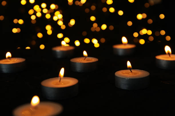 istock Concept of sadness and sorrow - sorrow candles 2150310621