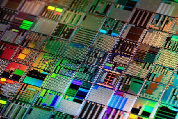 istock Silicon semiconductor wafer close-up. In electronics, a wafer also called a slice or substrate is a thin slice of semiconductor, a crystalline silicon, used for the fabrication of integrated circuits 2150310800