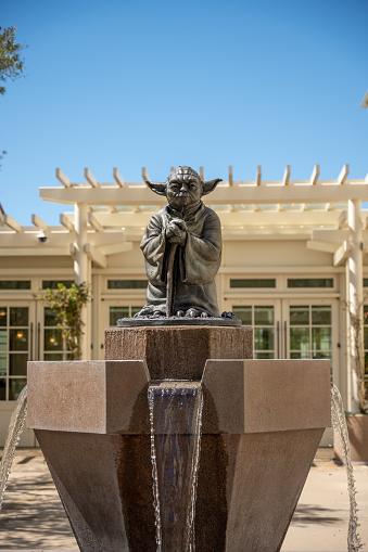 Yoda water fountain at the entrance of the Lucas film building in San Francisco during springtime day