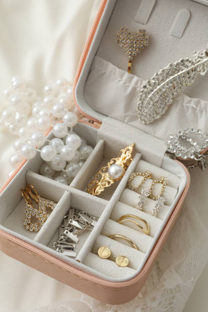 istock Jewelry box with wedding decorations on white background, close up 2150311527
