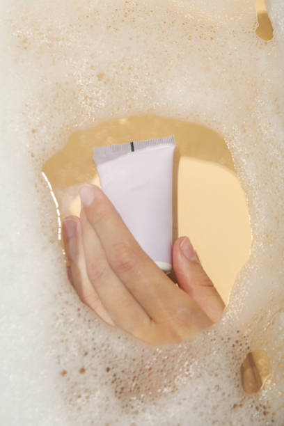 istock A bottle with a care product in foam. 2150311750