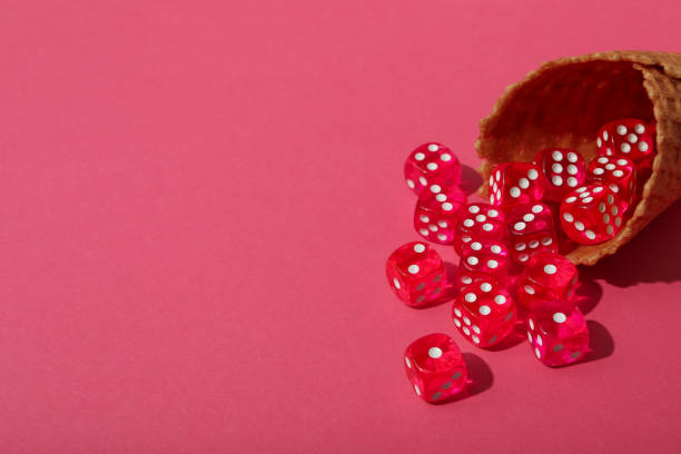 Dice and poker cards on white background