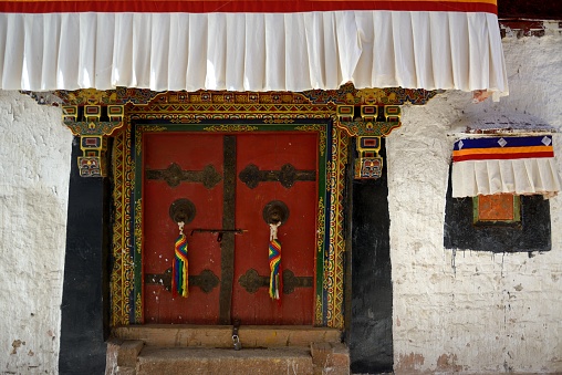 A gate of a house in Sera Monastery, Lhasa, China. Which is well decorated and painted.