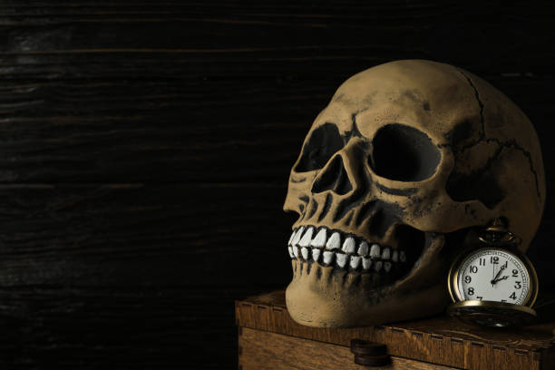 istock Columbus Day. Skull with a pocket watch 2150317588