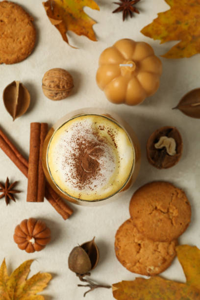 istock Pumpkin coffee, leaves and cinnamon on white background, top view 2150318493