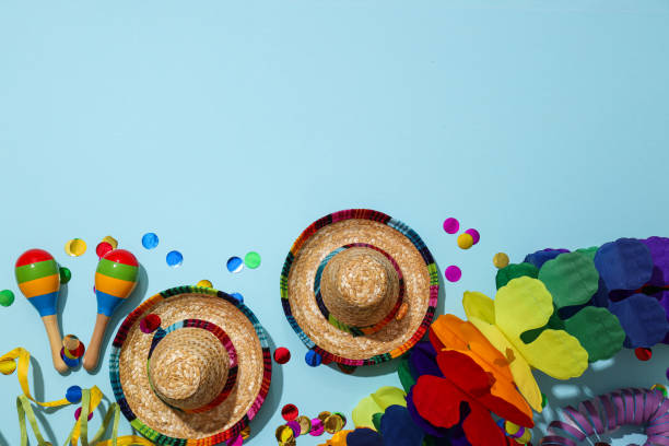 istock Confetti, marocas and hats on blue background, space for text 2150320133
