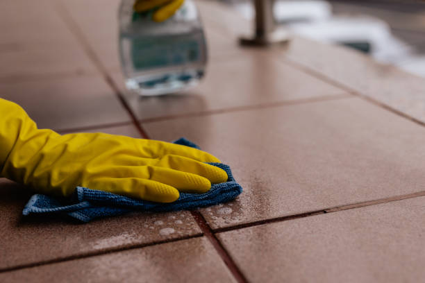 istock Woman cleaning tile floors outdoors, spring cleaning 2150323224