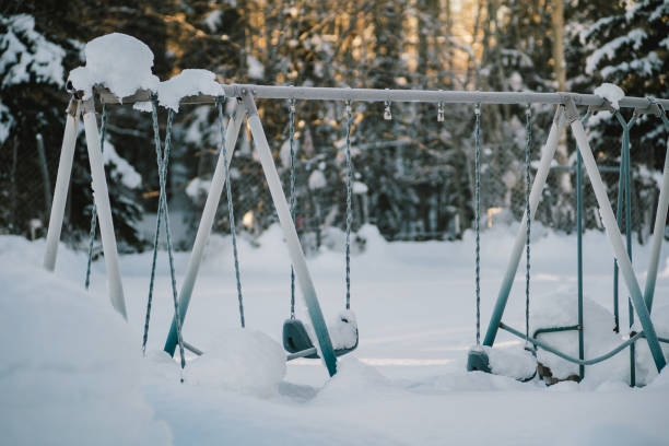 istock Thick snow covers a playground in Alaska, America. 2150323610