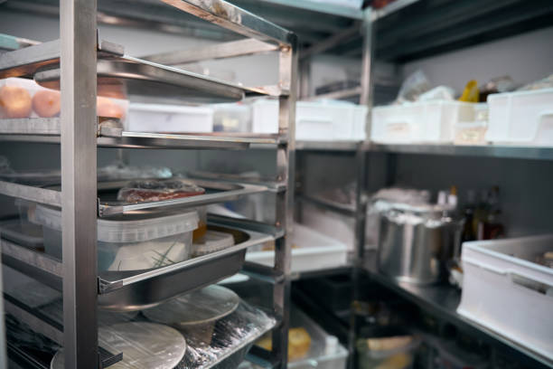 istock Focus of dishes on shelves in blurred refrigerator storage in restaurant 2150323749