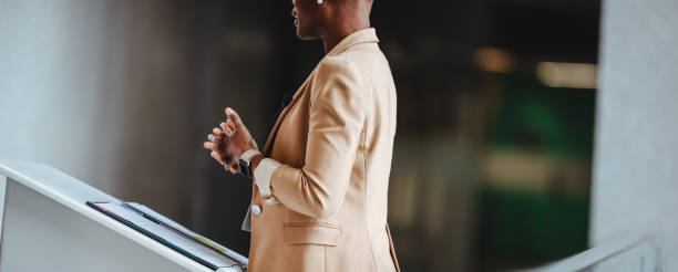 istock Professional speaker at business conference presenting to audience 2150324966