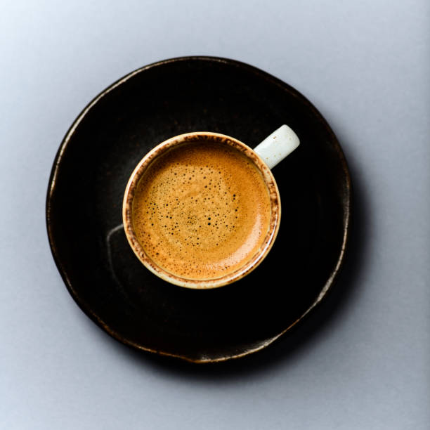 istock Cup of coffee on gray  background. Top view. Copy space. 2150329063