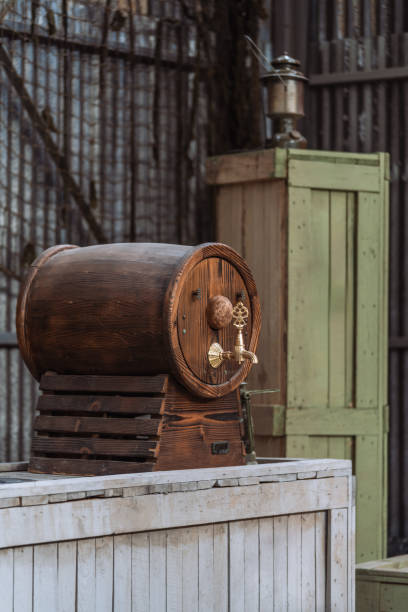 istock Old wooden barrels in a warehouse 2150331338