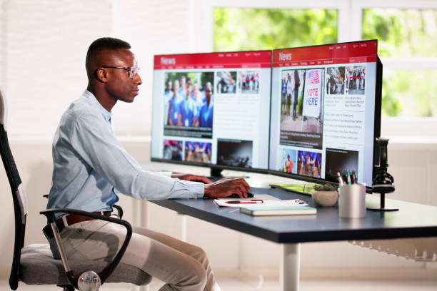 istock Reading News Article Headline On Laptop 2150331418