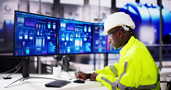 Engineer Operator Using Scada System Stock Photo - Download Image Now ...