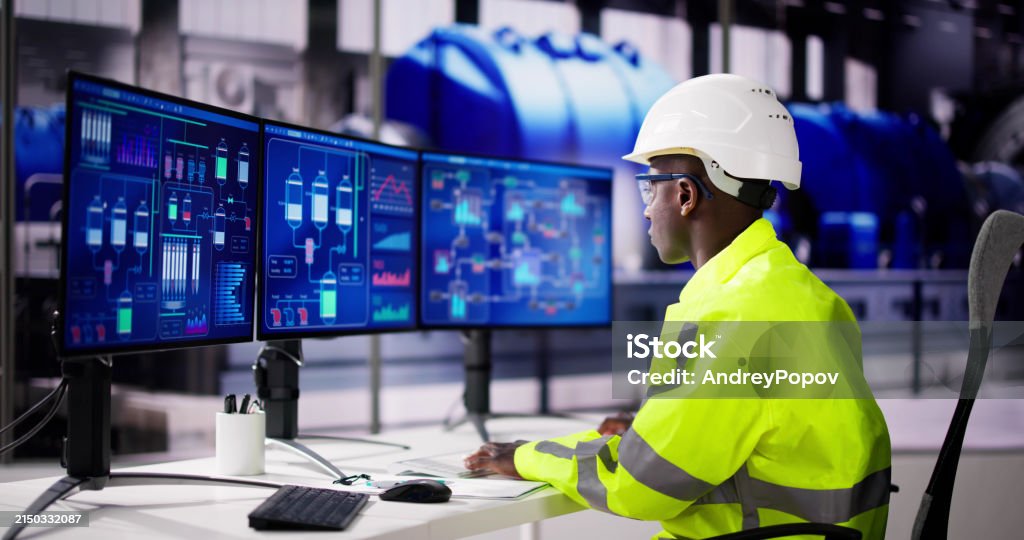 Engineer Operator Using Scada System Stock Photo - Download Image Now ...