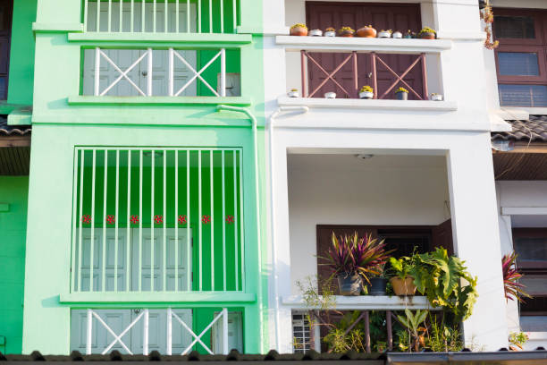 Small balconies of thai row houses in Bangkok Ladparo