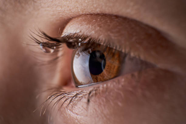 istock Eye of unrecognizable discontent kid with tears 2150334109