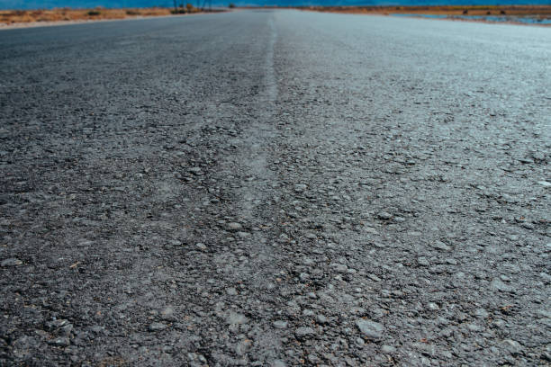 istock New asphalt road close-up 2150334313