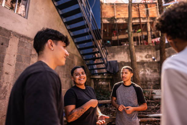 istock Young friends talking outdoors 2150335528