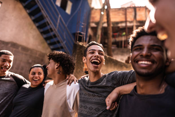 istock Young friends embracing outdoors 2150335557