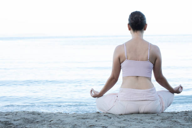 istock Yoga At The Beach 2150336848