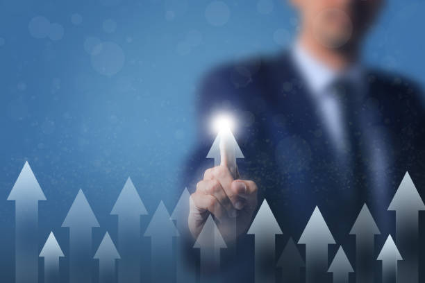 istock Business Growth and Performance - Man Selecting Rising Arrow Indicator 2150339753