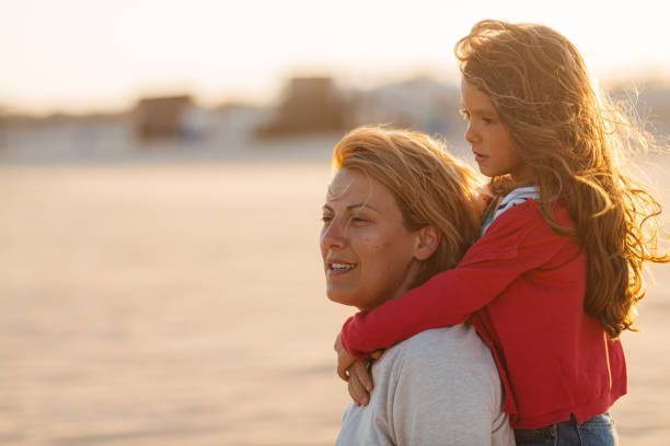 istock Family bonding moments at the beach 2150341292