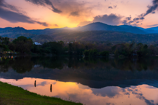landscape lake views at Ang Kaew Chiang Mai  in nature forest Mountain views with evening blue dramatic sunset sky background