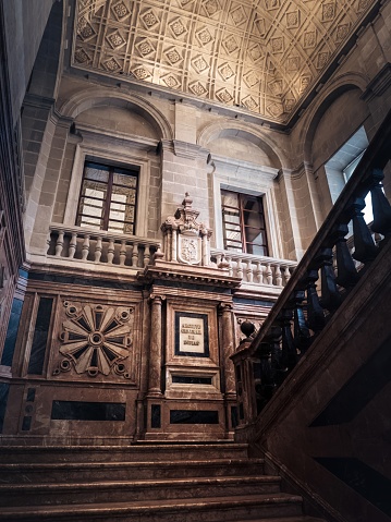 Seville, Spain - September 13, 2023: Archive of the Indies Interior (Archivo General de Indias) situated in 16th-century building (Casa Lonja de Mercadores, 1573). Marble central staircase. Seville, Andalusia, Spain
