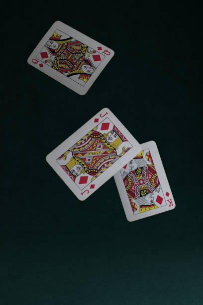 istock jack, queen and king of diamonds falling 2150350593