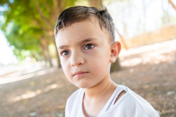 Happy muslim arabic boy playing in hte park