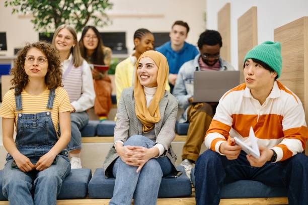 istock Smiling students listening to their lecture 2150353684