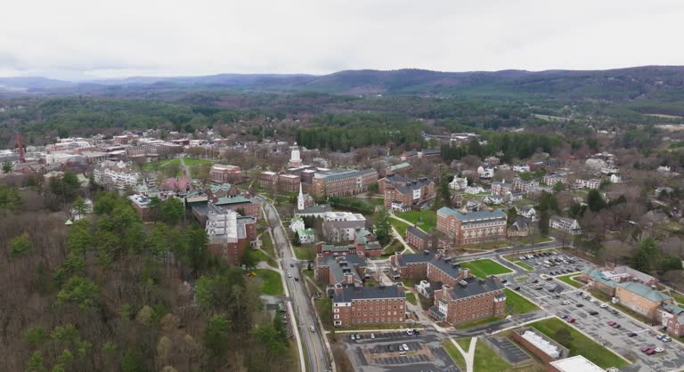 Spring aerial video of Hanover, NH on a partly cloudy day.