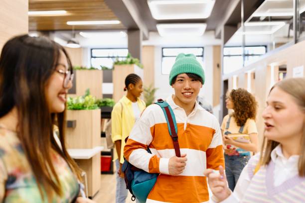 Portrait of a smiling Japanese student at the library