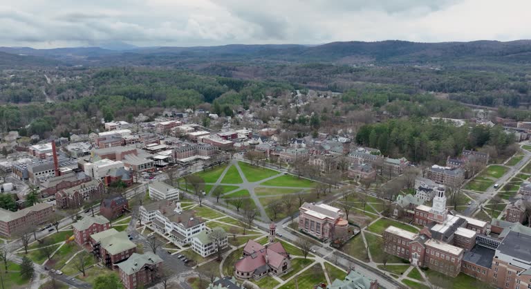 Spring aerial video of Hanover, NH on a partly cloudy day.