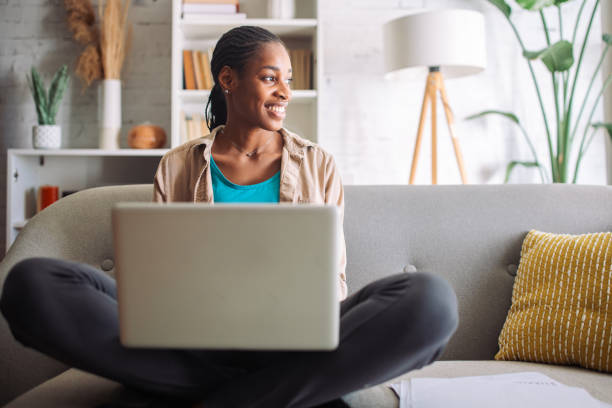 istock Happy woman video chatting on laptop 2150355544
