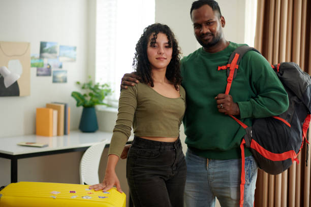 istock Young man with backpack and his wife 2150356430