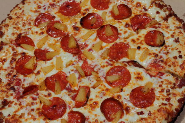 istock A pepperoni, pineapple and cheese pizza 2150357041