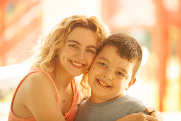 istock Happy brother and sister having fun 2150357799