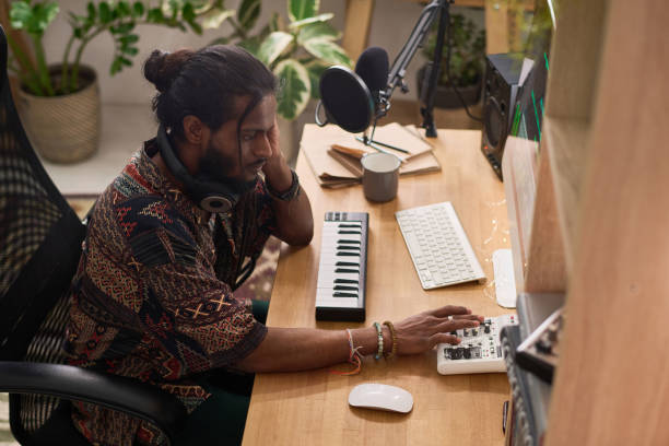 istock Musician creating new music in studio 2150358428